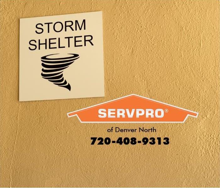 A “tornado shelter” sign is shown guiding building residents to safety.